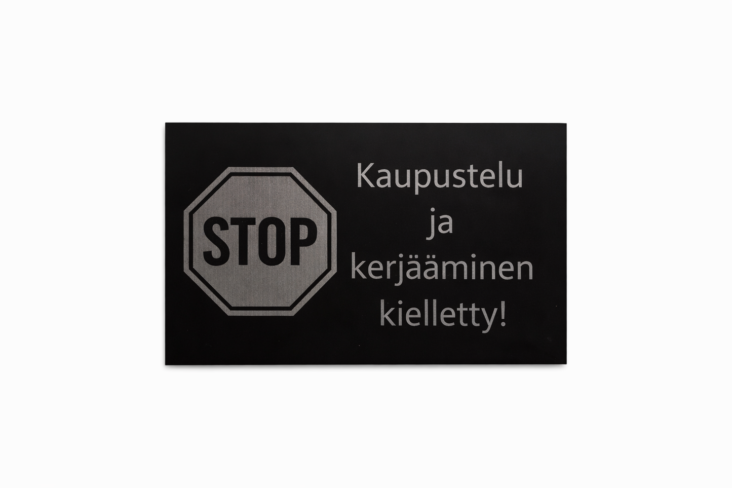 Kaupustelu kielletty kyltti.
